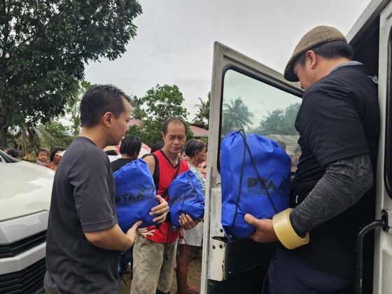Cebu — relief packs handed out after Typhoon Tino
